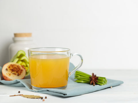 fragrant homemade broth in a glass mug